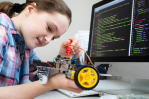 Female Pupil Building Robotic Car